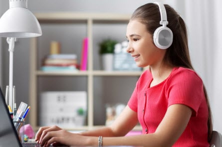 Girl typing on laptop